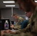 Region II Best Warrior competitors complete a written test and essay