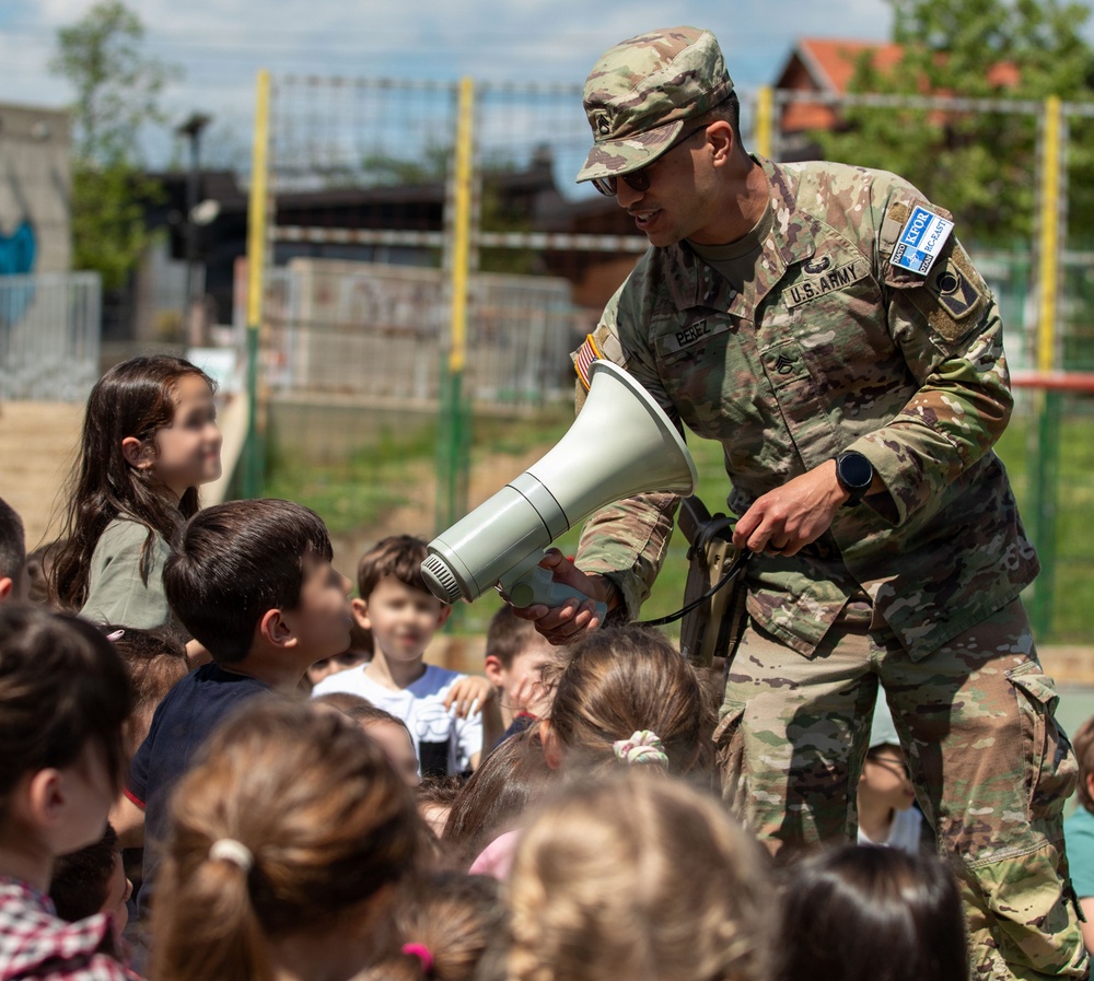 KFOR Soldiers engage students during medical outreach in Pristina