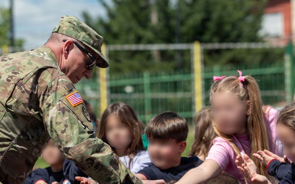 KFOR Soldiers engage students during medical outreach in Pristina