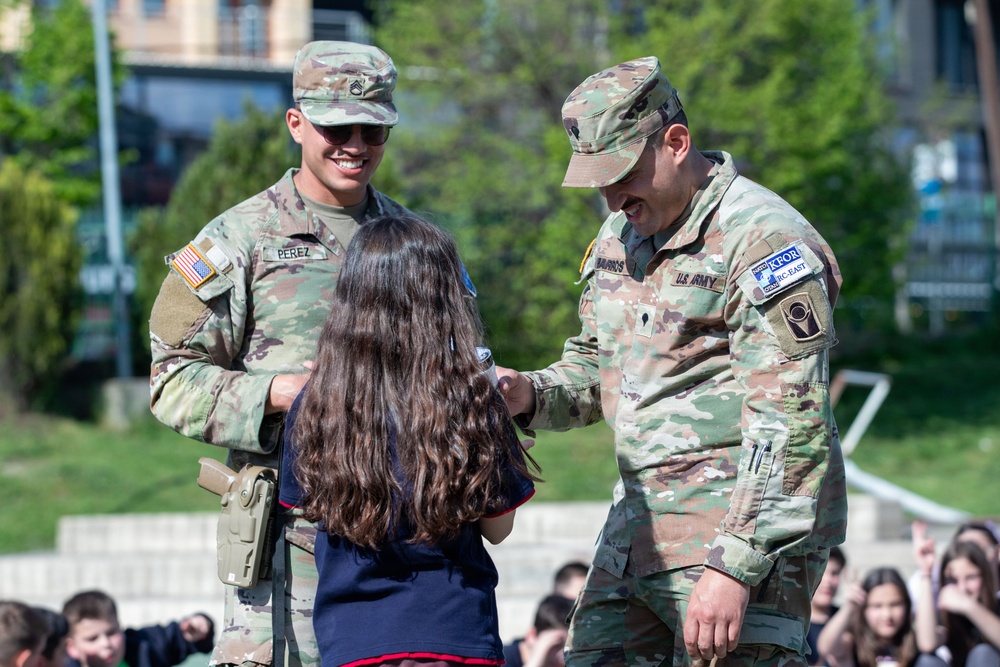 KFOR Soldiers engage students during medical outreach in Pristina