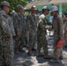 Balikatan 2026: U.S. Marine receives a Navy and Marine Corps Achievement Medal during the construction of a multi-purpose facility
