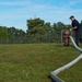 ‘The hose is our lifeline in a fire’: Robins Fire and Emergency Services team conducts annual hose testing
