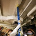 Sailors use metal shoring for damage control drill onboard USS Lake Erie (CG 70)