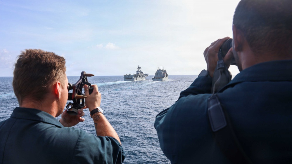 USS Lake Erie (CG 70) conducts a replenishment-at-sea with USNS Robert E. Peary (T-AKE 5)