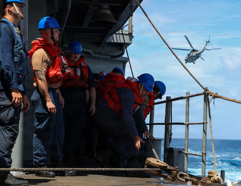 USS Lake Erie (CG 70) conducts a replenishment-at-sea with USNS Robert E. Peary (T-AKE 5)