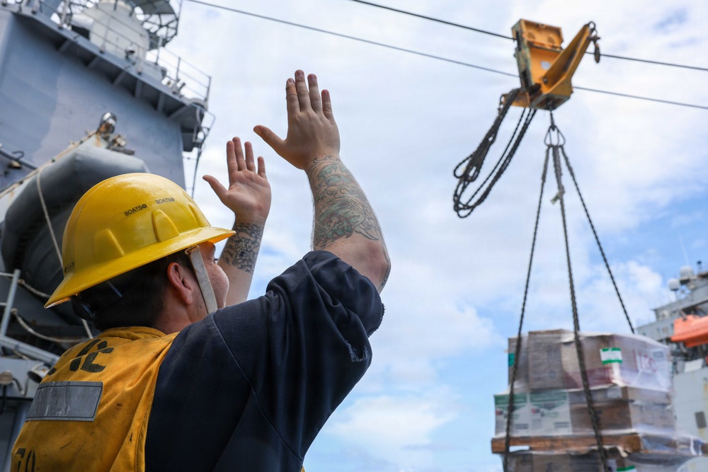 USS Lake Erie (CG 70) conducts a replenishment-at-sea with USNS Robert E. Peary (T-AKE 5)