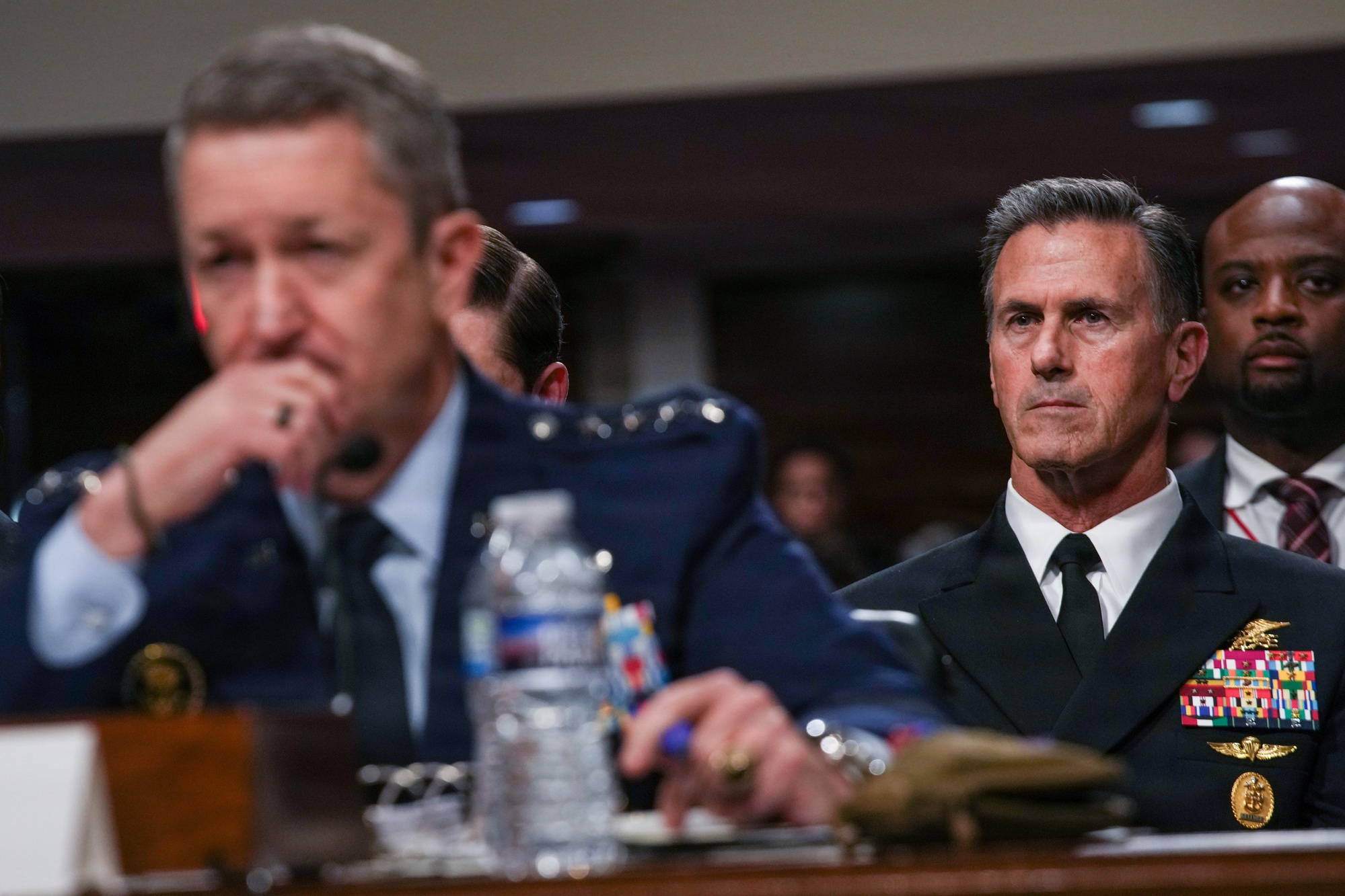 Defense Secretary Pete Hegseth, Gen. Dan Caine, and Jules Hurst testify at the April 30 Senate Armed Services Committee hearing. Photo by Mass Communication Specialist 1st Class Marc O. Cuenca via DVIDS (public domain).