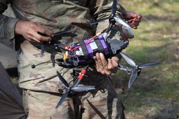 U.S. Soldiers from the 1st Squadron, 2d Cavalry Regiment assemble and tests drones