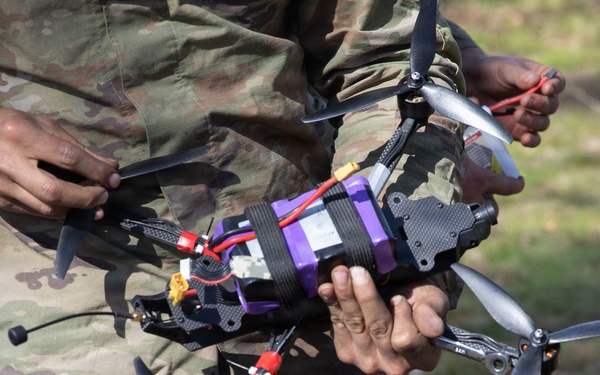 U.S. Soldiers from the 1st Squadron, 2d Cavalry Regiment assemble and tests drones