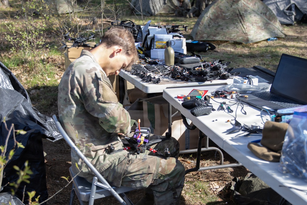 U.S. Soldiers from the 1st Squadron, 2d Cavalry Regiment assemble and tests drones