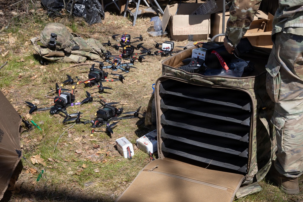 U.S. Soldiers from the 1st Squadron, 2d Cavalry Regiment assemble and tests drones