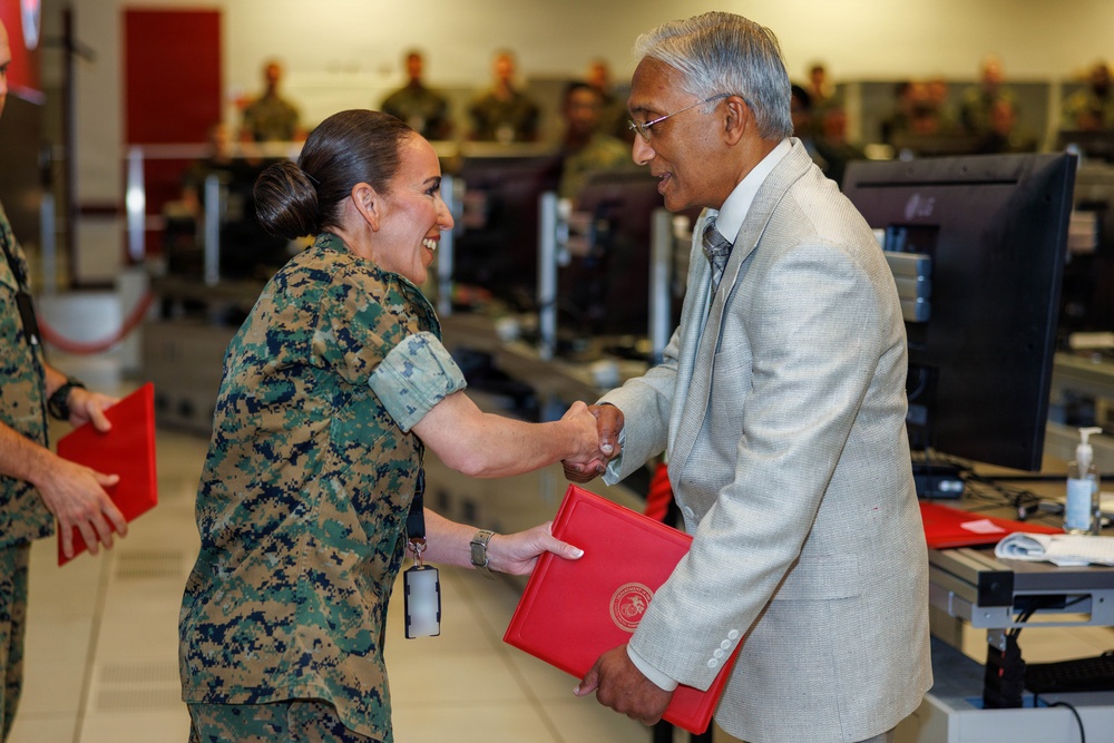 MCCOG presents Awards during Monthly Formation