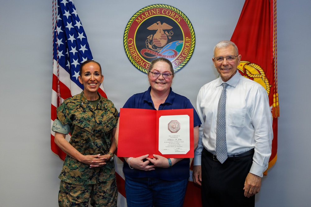 MCCOG presents Awards during Monthly Formation
