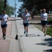 Airmen Run to Honor Fallen Members of ‘Port Dawg’ Community