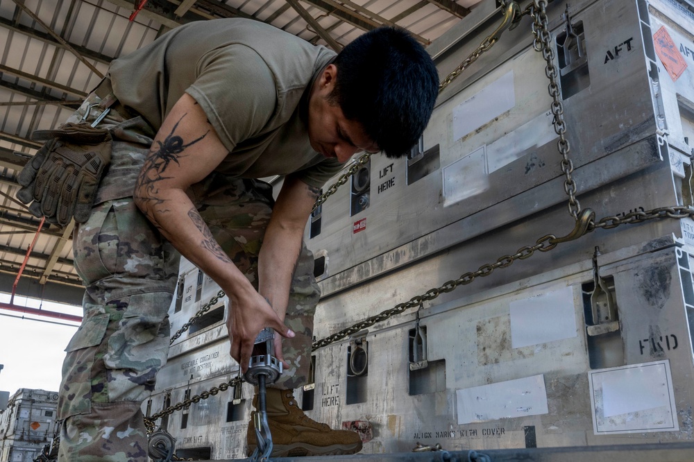 Airmen, Sailors strengthen interoperability during munitions pallet build