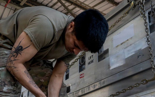 Airmen, Sailors strengthen interoperability during munitions pallet build