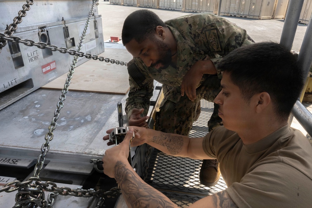 Airmen, Sailors strengthen interoperability during munitions pallet build
