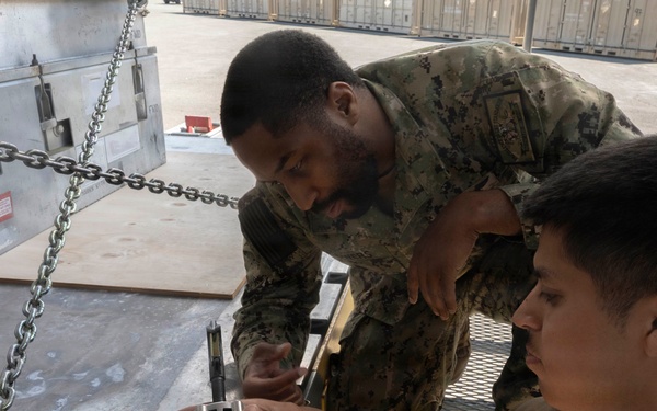 Airmen, Sailors strengthen interoperability during munitions pallet build