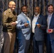 O6 Panel Receives Challenge Coins