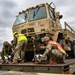 1st Armored Division vehicles and equipment rolling in to support Cadet Summer Training