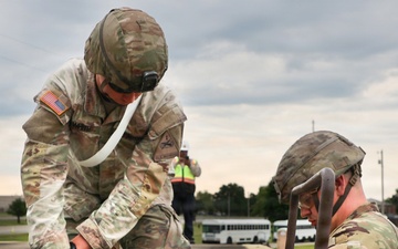 1st Armored Division vehicles and equipment rolling in to support Cadet Summer Training
