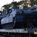 1st Armored Division vehicles and equipment rolling in to support Cadet Summer Training