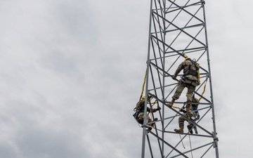 Engineering Installation Airmen sharpen tower-climbing skills during mission training