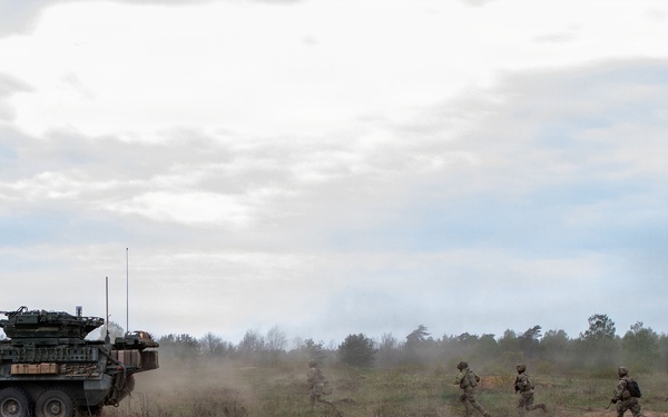 U.S. Soldiers in 2d Cavalry Regiment perform familiarization berm drills with M1296 Stryker infantry carrier vehicle