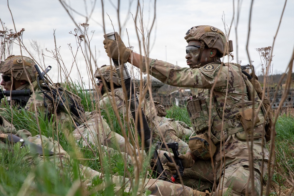 U.S. Soldiers in 2d Cavalry Regiment perform familiarization berm drills with M1296 Stryker infantry carrier vehicle