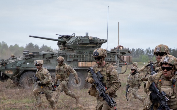 U.S. Soldiers in 2d Cavalry Regiment perform familiarization berm drills with M1296 Stryker infantry carrier vehicle