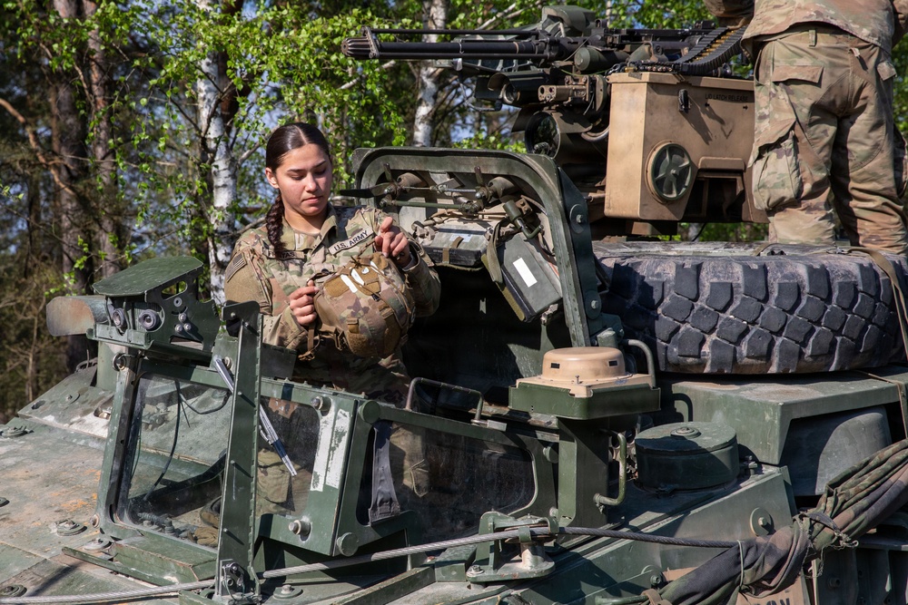 U.S. Soldiers in 2d Cavalry Regiment perform familiarization berm drills with M1296 Stryker infantry carrier vehicle