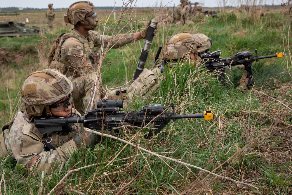 U.S. Soldiers in 2d Cavalry Regiment perform familiarization berm drills with M1296 Stryker infantry carrier vehicle
