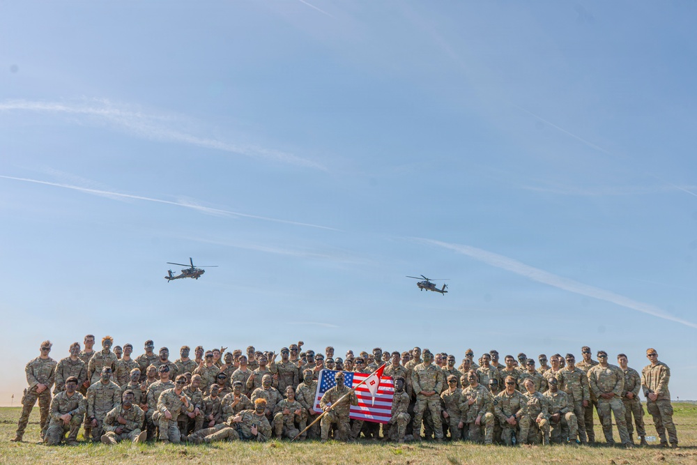 Bull Troop, 2d Cavalry Regiment, holds reenlistment ceremony during Saber Strike 26