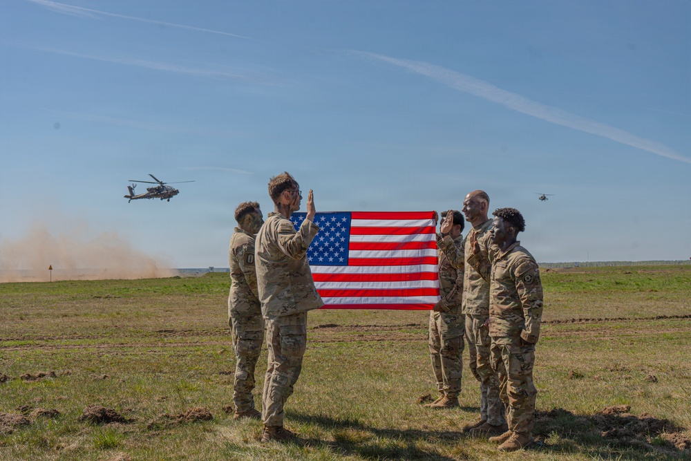 Bull Troop, 2d Cavalry Regiment, holds reenlistment ceremony during Saber Strike 26