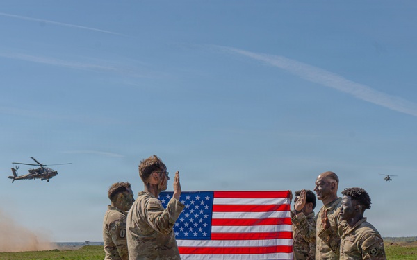 Bull Troop, 2d Cavalry Regiment, holds reenlistment ceremony during Saber Strike 26