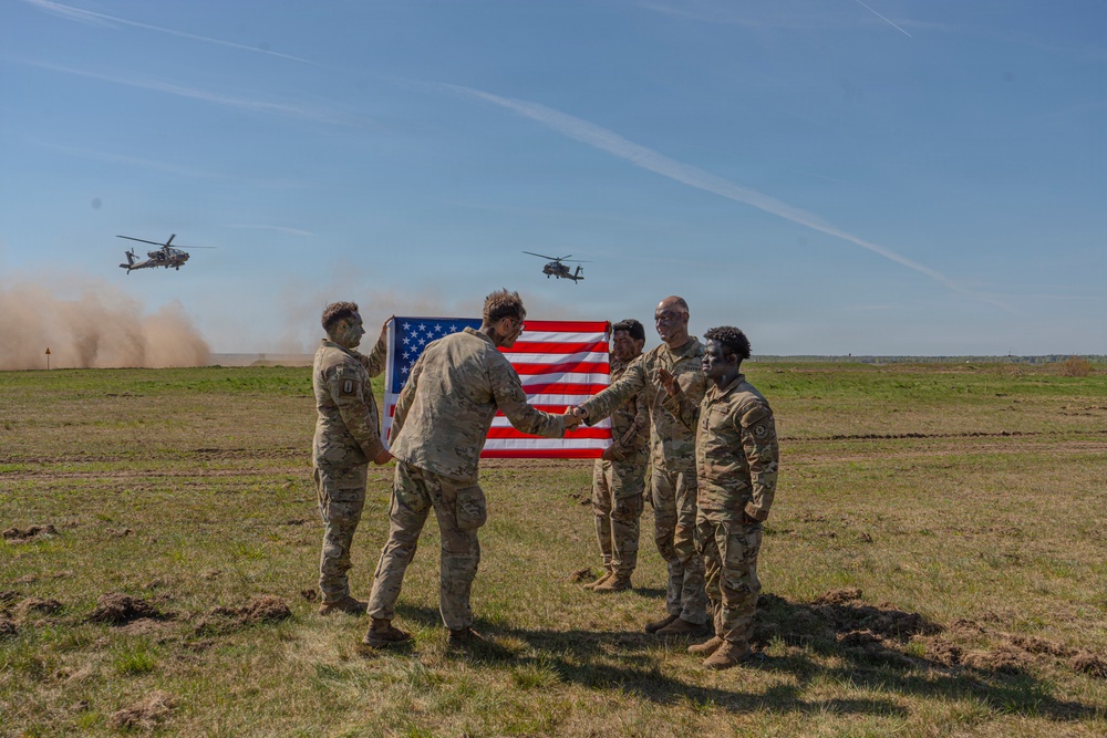 Bull Troop, 2d Cavalry Regiment, holds reenlistment ceremony during Saber Strike 26