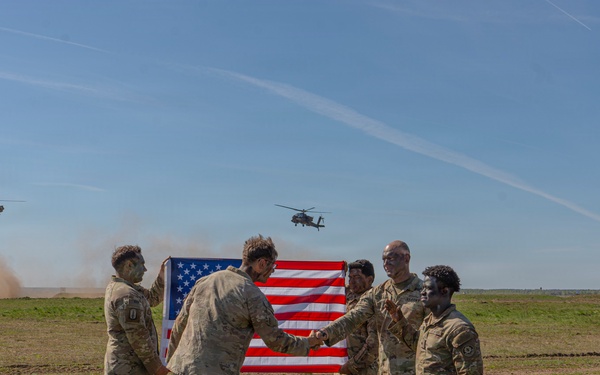 Bull Troop, 2d Cavalry Regiment, holds reenlistment ceremony during Saber Strike 26