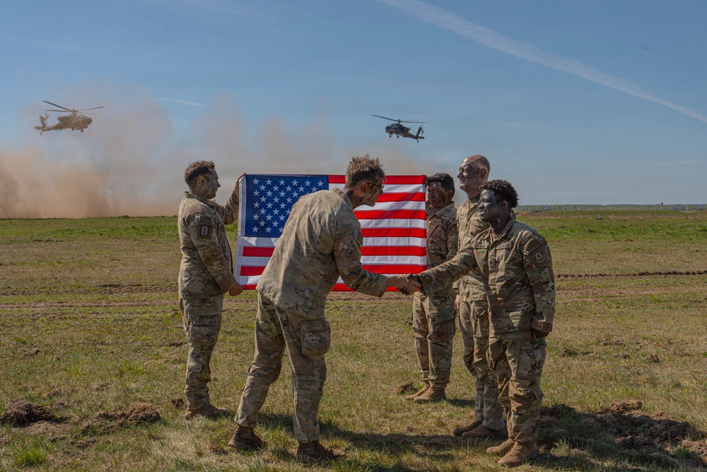 Bull Troop, 2d Cavalry Regiment, holds reenlistment ceremony during Saber Strike 26