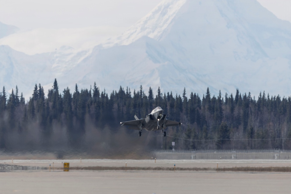 U.S. service members participate in flight operations during exercise Red Flag-Alaska