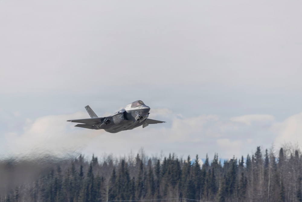 U.S. service members participate in flight operations during exercise Red Flag-Alaska