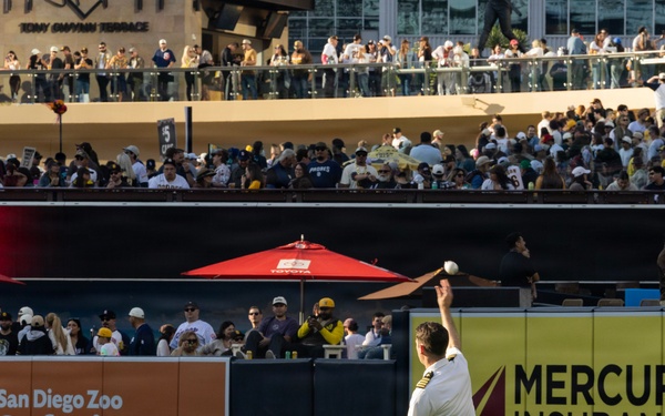 Commanding Officer of Naval Base Coronado throws first pitch during NASCAR day at Petco Park