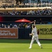 Commanding Officer of Naval Base Coronado throws first pitch during NASCAR day at Petco Park