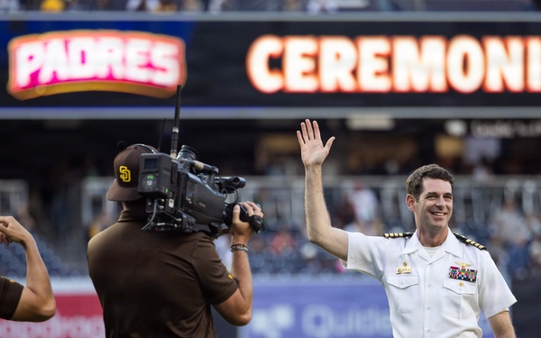 Commanding Officer of Naval Base Coronado throws first pitch during NASCAR day at Petco Park