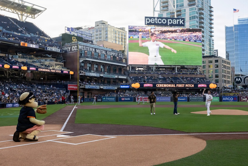 Commanding Officer of Naval Base Coronado throws first pitch during NASCAR day at Petco Park