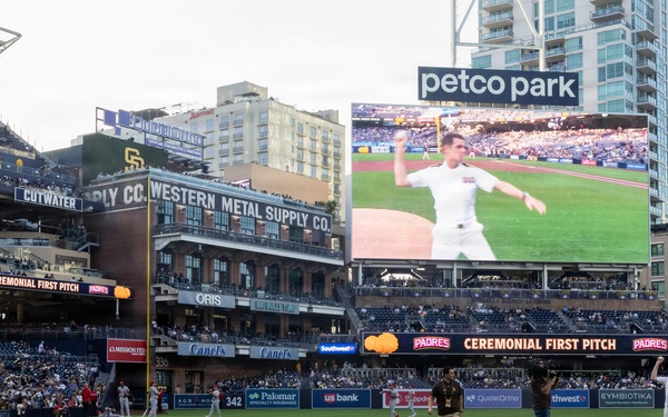 Commanding Officer of Naval Base Coronado throws first pitch during NASCAR day at Petco Park