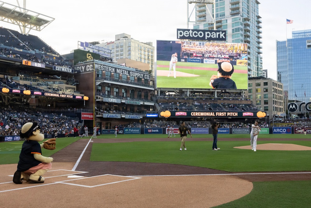 Commanding Officer of Naval Base Coronado throws first pitch during NASCAR day at Petco Park