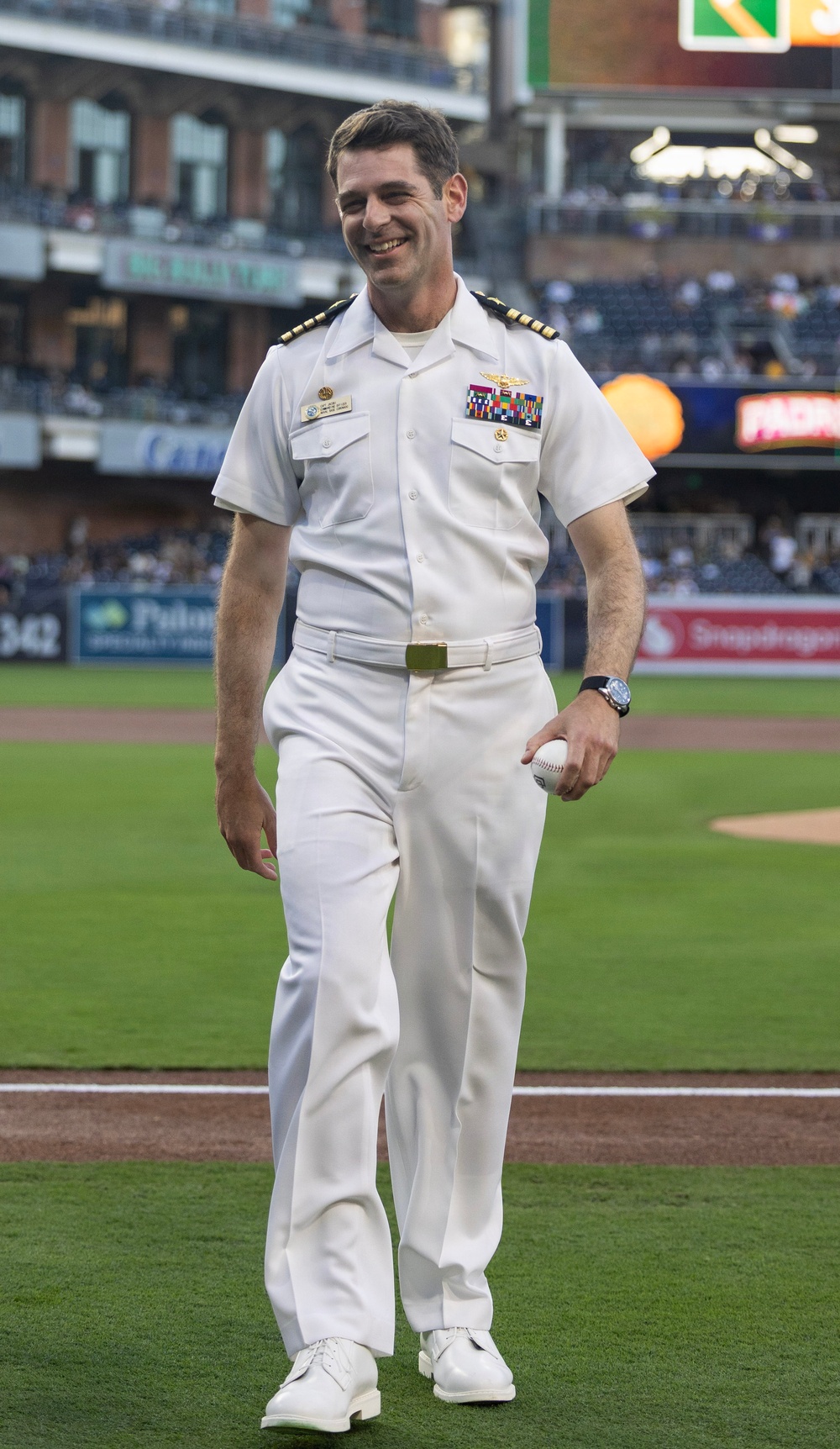 Commanding Officer of Naval Base Coronado throws first pitch during NASCAR day at Petco Park