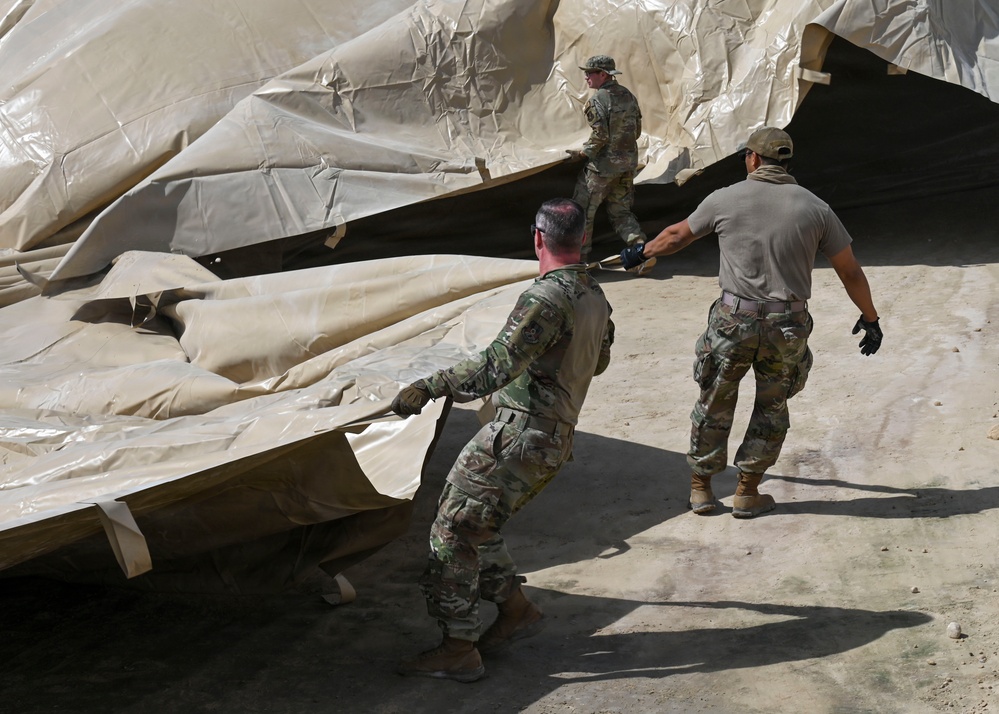 USAFCENT Airmen install POL liner