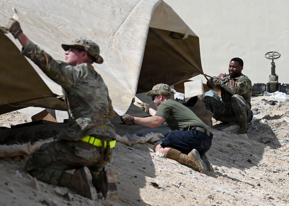 USAFCENT Airmen install POL liner