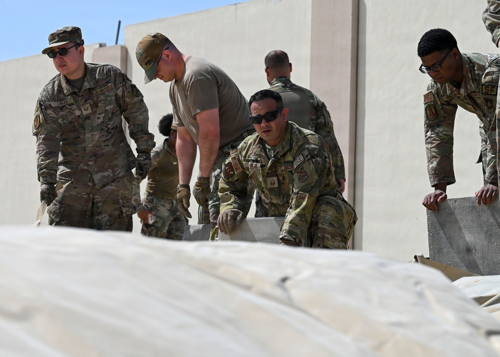 USAFCENT Airmen install POL liner